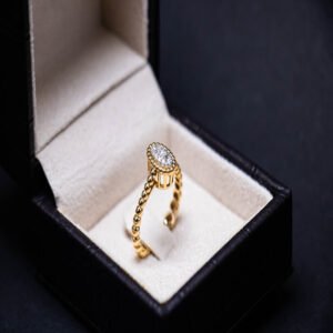 gold ring with an oval diamond