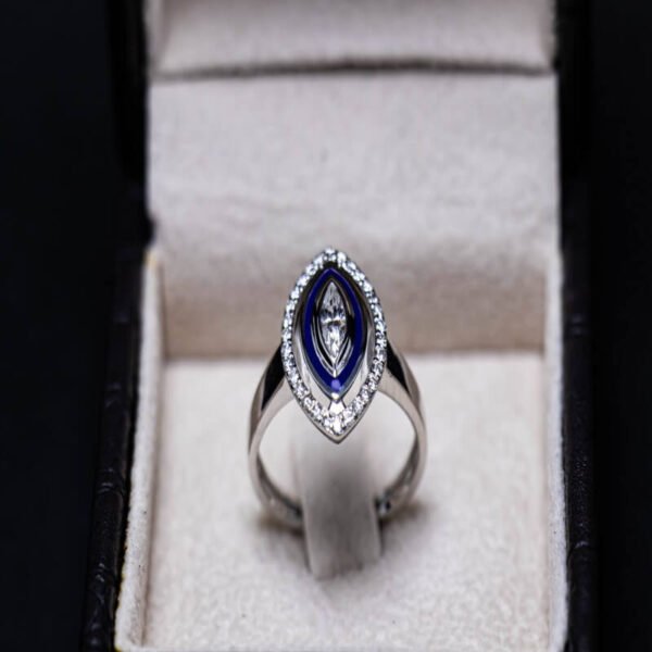 marquise diamond ring with a white gold and navy color